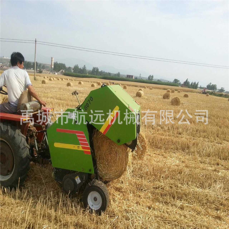 小麦玉米秸秆捡拾打捆机，小型拖拉机后牵引的干湿秸秆两用圆捆打捆机械示例图2