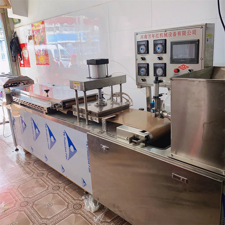 烙馍机 多功能烙馍机 万年红机械TL450型 全自动烤鸭饼机价格