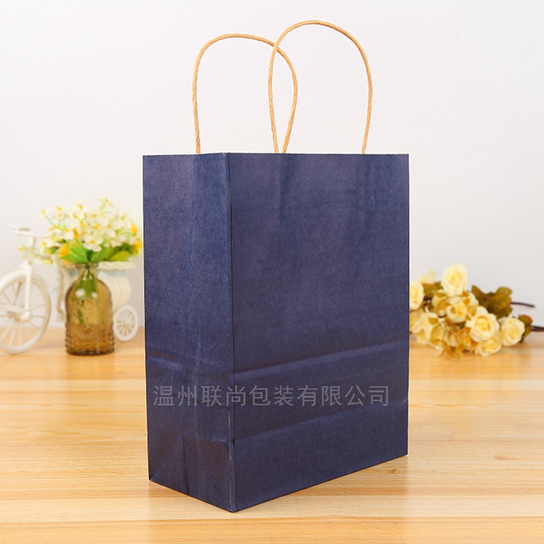 牛皮纸手提礼品包装纸袋定做通用环保广告服装购物外卖打包袋定制示例图4