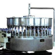 钙片定量灌装机 颗粒灌装旋盖机 胶囊灌装生产线图片