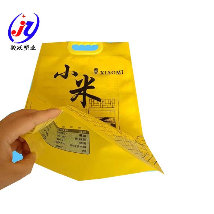 黄小米包装袋 5斤小米包装袋子 小米真空包装袋 手提式小米塑料袋 抽真空米砖黄小米袋子生产厂家图片