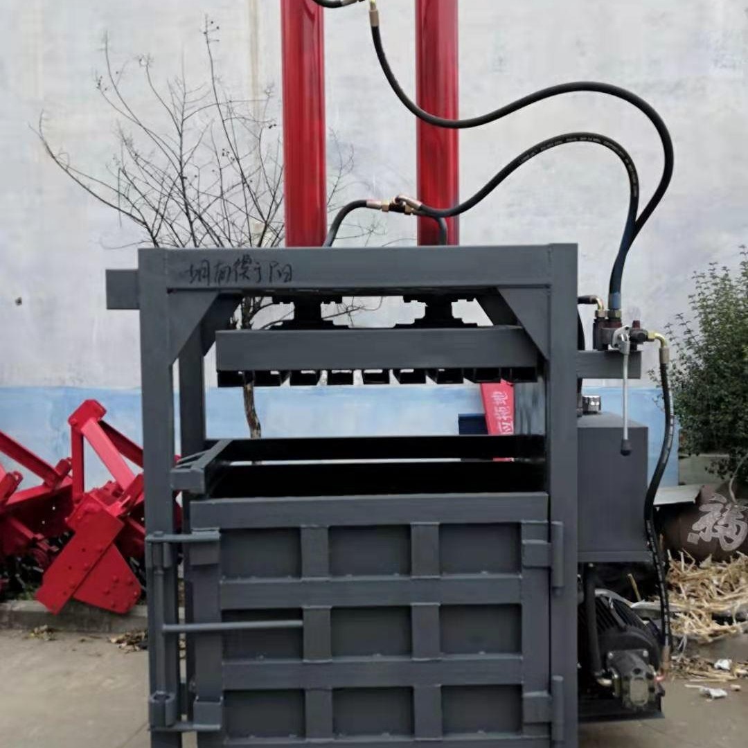 塑料薄膜半自动打包机  180型金属铁桶压块机 自动铁桶压扁机图片