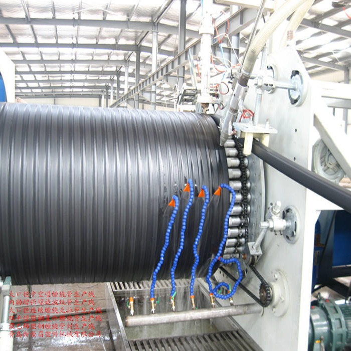 HDPE双平壁塑钢缠绕管机械、PE大口径中空壁缠绕管设备、聚乙烯钢塑复合排水管生产线厂家图片