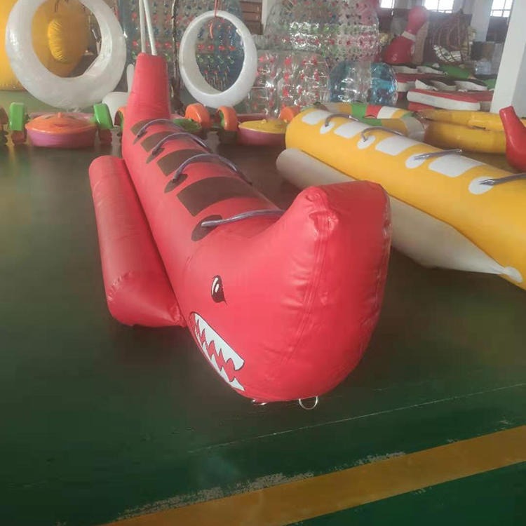旭兴 xx-1  充气水上儿童香蕉船 跷跷板水上玩具水上乐园跳床水上浮具图片