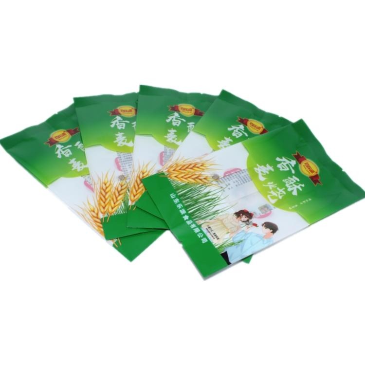 德远塑业厂家定制彩印白色牛皮纸四边封袋 葡萄干休闲食品袋 防潮食品包装袋图片